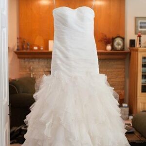 Wedding Dress worn in 2012 and it has been boxed since October 2012.